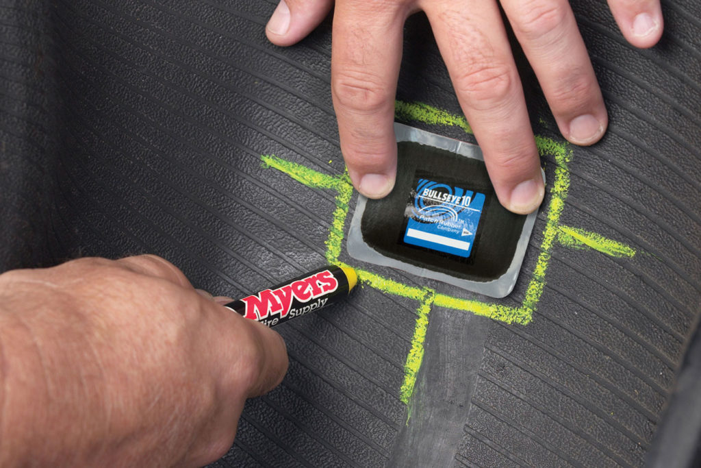 Repairing a tire in the shop - Patch Rubber Products