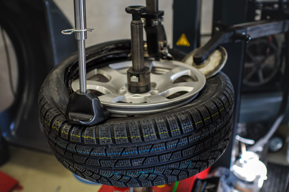 Myers Tire Supply installing a new tire on a rim