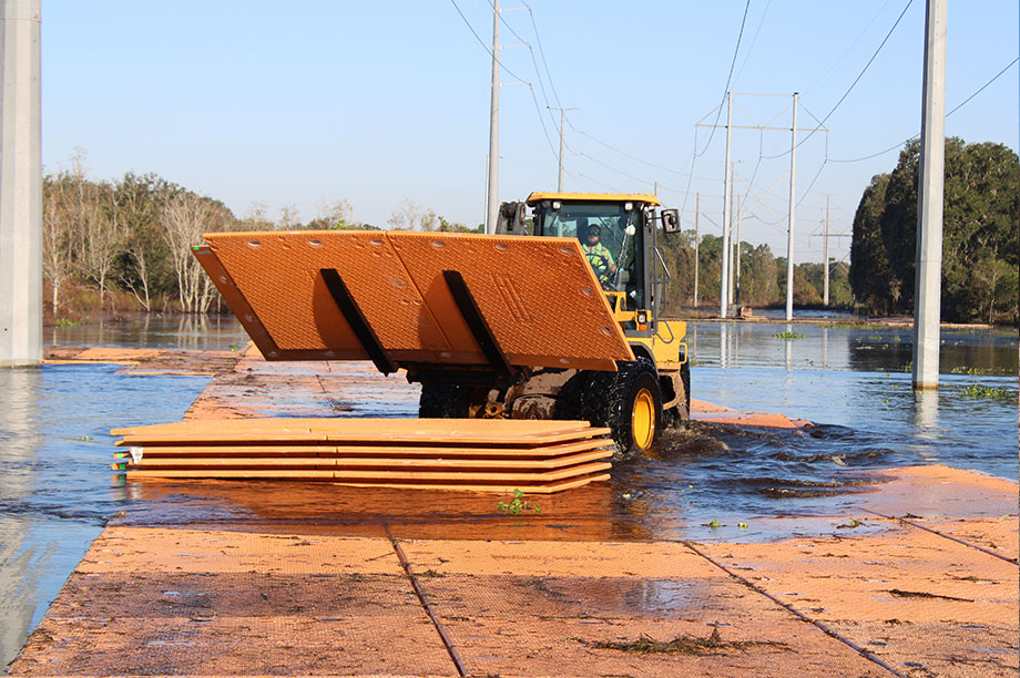 Signature Systems - Construction Mats in the field being installed